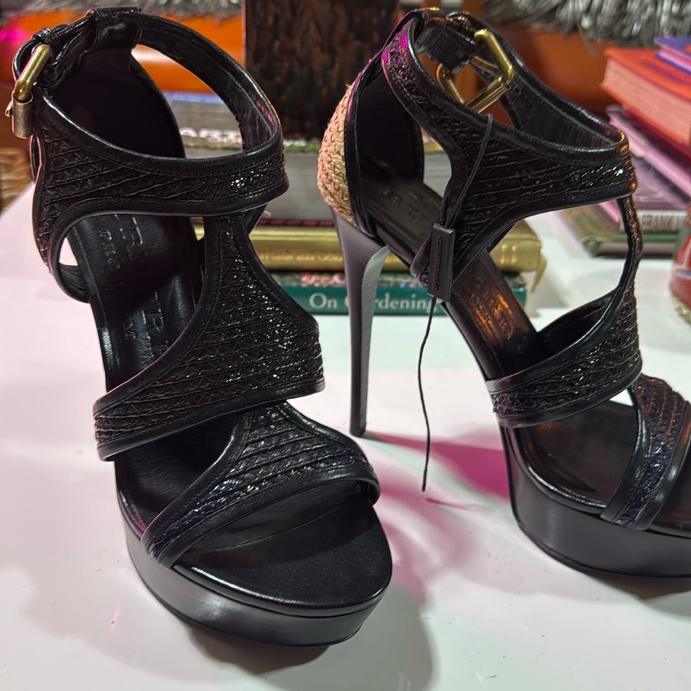 Burberry black platform heels fits like a glove. Never worn. Size 8